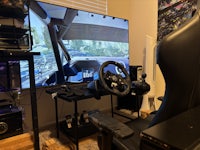 a gaming chair in a room with a tv